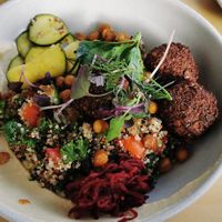 Breakfast bowl - quinoa, cucumber, tomato, hummus, beetroot relish, fresh dill and parsley, crispy chickpeas and falafel. This was one of the best, if not the best salad I've ever  at Clodeli in Randwick