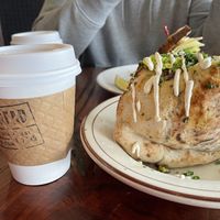 Coffee for scale on how large this pita sandwich is! at Lodge Bread in Los Angeles