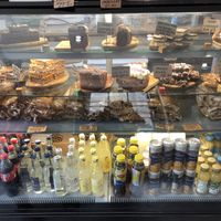 The top shelf has vegan options which are clearly marked   at Cinnamon Coffee Shop in London