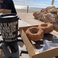  Vegan cinnamon donuts w/ vegan latte macchiato at the beach ( Playa la carihuela ) at Naranjito in Torremolinos