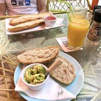 Pitufo with avocado, baguette with tomato sauce, freshly squeezed orange juice (plastic straw unfortunately).  at Naranjito in Torremolinos
