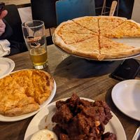 Fantastic Pizza with different vegan cheese options. at Rise Above Pizza & Wings in Hamilton