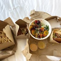 Fries, yam fries, beet & apple salad, and chick-un sandwich at BeetBox in Vancouver