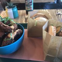 Onion rings and chickun burger at BeetBox in Vancouver