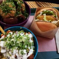 Onion rings, chilli cheese fries, chickun burger at BeetBox in Vancouver