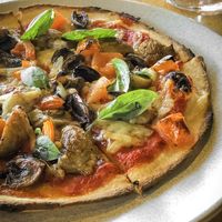 Charlie the Vegan pizza with cheese added at Balthazar in Adelaide