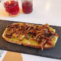 'Tiger' crouton. Mushrooms, sundries tomatoes and a tasty green sauce at Gatto Bistrot in Portici