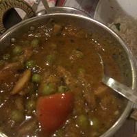 the house specialty: mild curry w peas & mushroom  at Indian Palace in Olten