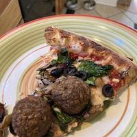 Vegan pizza slice at The Secret Stash in Crested Butte