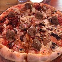 My vegan pizza with vegan meatballs & pepperoni, vegan cheese, mushrooms, sun dried tomatoes, & mushrooms. at The Secret Stash in Crested Butte
