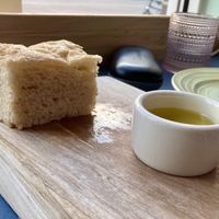 Complimentary focaccia and OO  at Somebody People in Denver