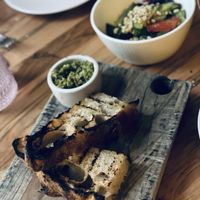 Bread, cucumber salad  at Somebody People in Denver