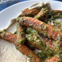 Carrots with tahini hummus and turnip greens  at Somebody People in Denver