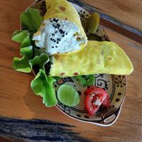 Avocado, tofu scramble wrap. at Foods & Roots in Koh Phangan