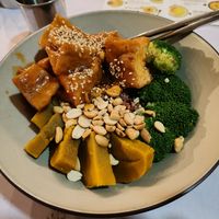 Tofu on a bed of brown rice. Delicious and so filling. at Khong Vegan Restaurant  in Da Nang