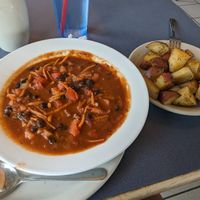 Vegan chili and side of Rosemary potatoes at Cafe Brazil in Dallas