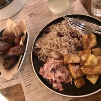 Jerk tofu main with a side of plantain. at Turtle Bay in Leamington Spa