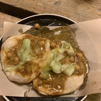 Trini doubles, curried chickpeas, bara roti flatbreads, hot sauce, coconut & cucumber chutney  at Turtle Bay in Leamington Spa