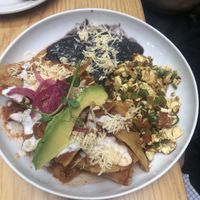 Chilaquiles roja with side of tofu  at Choclo y Maíz Cocina Vegana in Guadalajara