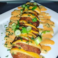 "Major Figgas"- Our mini krab cakes made with jackfruit & hearts of palm, drizzled with 2 house made sauces at Go Vegan Philly in Wilmington