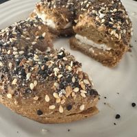 Gluten free sourdough everything bagel with vegan cream cheese  at Uprising Bakehouse in Burlington