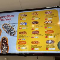 The menu board with the vegan beavertails labeled.  at BeaverTails in Niagara Falls