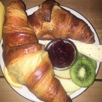 breakfast with non vegan croissants  at Café Kater in Leipzig