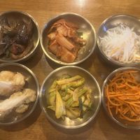 Top row pickled eggplant, kimchi, radishes bottom row cauliflower, spicy cucumbers and carrot salad  at Kaya Korean in Dushanbe
