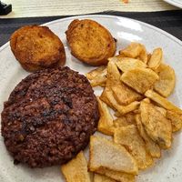 Burger, grilled bread and patatas at Carmen in Organya