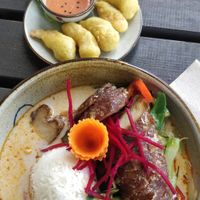 Seitan shrimp and crispy seitan duck with coconut curry sauce at Element Five in Berlin