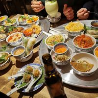 Twenty bowls of various vegan dishes at Element Five in Berlin