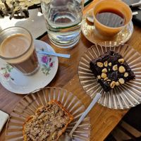 Mocha coffee with oat milk, banana bread, vegan brownie at Tiffin Cafe in Lisbon