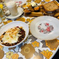 Homemade granola, local wholegrain bread, w home made jams and soy chai latte at Tiffin Cafe in Lisbon