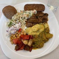 Several different salads and proteins, all vegan! And unlimited housemade bread rolls.   at Kring - Center in Sofia