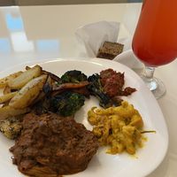Potatoes, seitan curry, veg, lentil loaf in tomato sauce, creamy pasta  at Kring - Center in Sofia