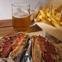The vegan burger with a homemade beetroot pattie and french fries - yummy at Burger Street in Paros