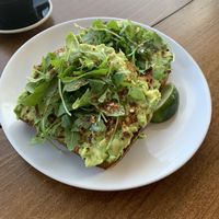 This avo toast is a double order, shared between two. at Captain + Stoker in Monterey