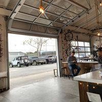 Inside of cafe looking out at the parking lot  at Captain + Stoker in Monterey