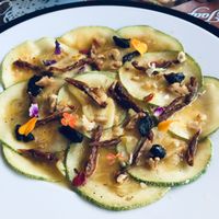 Zucchini carpaccio with edible flowers at Joapira in El Hierro