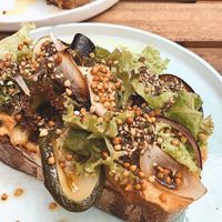 Vegan Sourdough Bread with Hummus and different toppings at Manna Porto in Porto