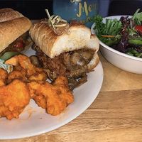 Jackfruit cheesesteak w/ a side salad and cauliflower buffalo bites at Northern Soul in Hoboken