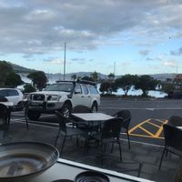 View from our table across the harbour at Careys Bay Historic Hotel in Dunedin