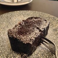 Chocolate cake and cold brew coffee at Dankbar Kaffee in Leipzig
