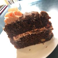 Turkish delight cake with beautiful pink striped icing and a layer of actual TD!  at Tom's Diner in Banbury