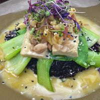 Macadamia Crusted Tofu coconut black rice, bok choy, Passion fruit butter sauce, pineapple salsa   at Pacific Coast Grill in Cardiff