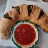 Vegan calzone with spinach, portobellos, zucchini, squash, artichokes and vegan cheese at Pie in the Sky in Baltimore