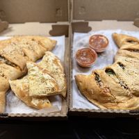 Spicy chicken mushroom calzone, garlic bread, pepperoni and veggie calzonee  at Pie in the Sky in Baltimore