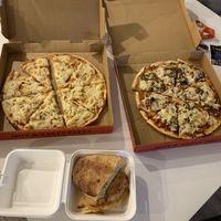 Vegan Hawaiian, meat lovers & garlic bread  at ZigZag Pizzeria in Modbury