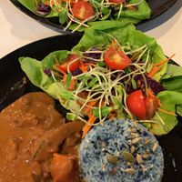 Massaman curry with pea flower jasmine rice and salad at Street Vegan House in Koh Phangan