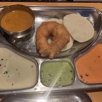 Idli + vada and a variety of chutneys and sambar at Krishna Vilas in Utrecht